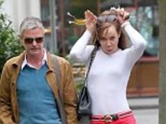 Forget Jessica Rabbit: A slender looking Tara Palmer-Tomkinson reveals her tiny waits out with a mystery man