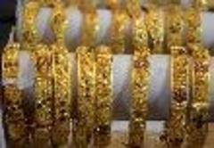 Gold, silver prices fall to record low on strengthening dollar